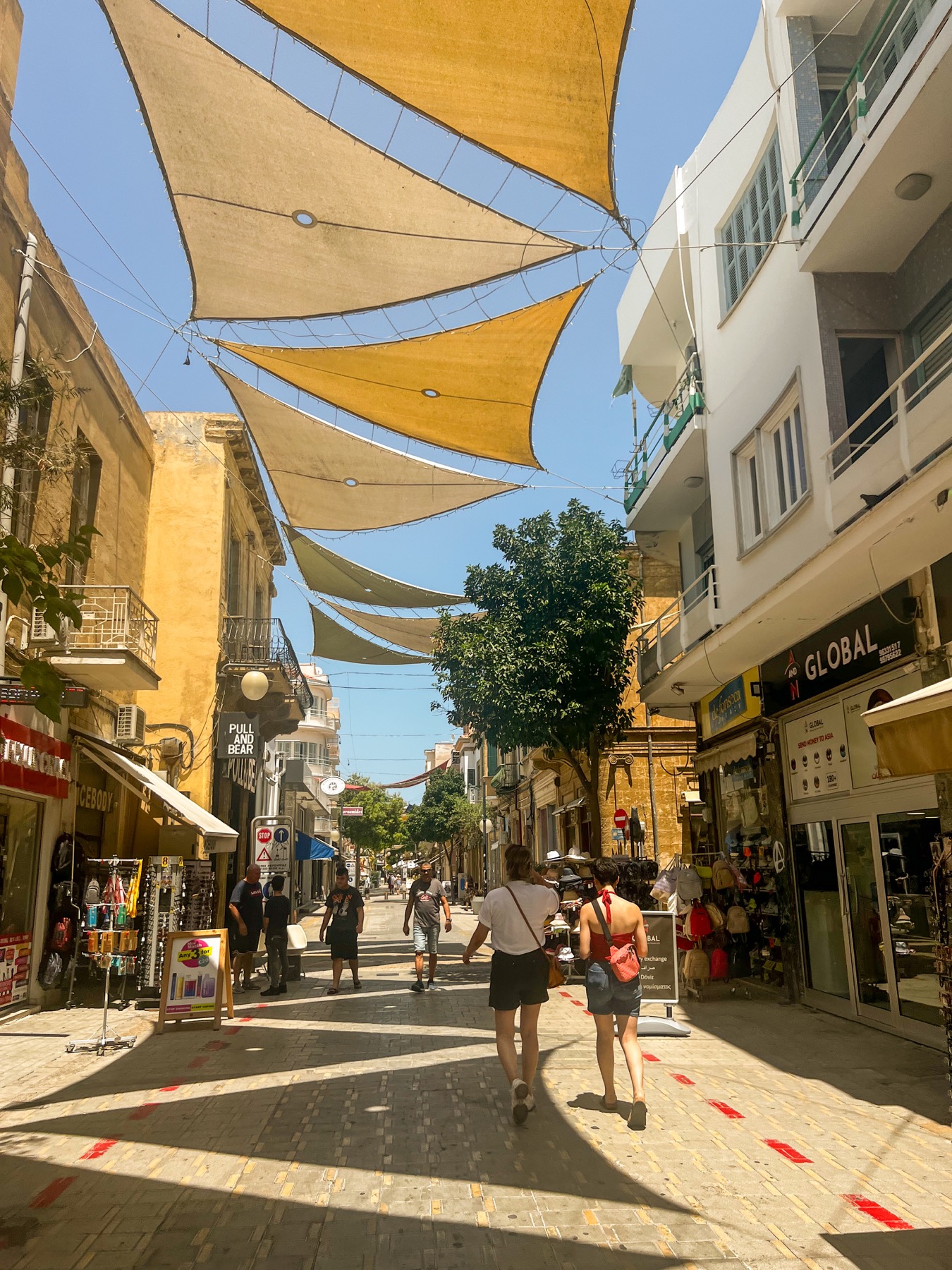 A shaded shopping street in Nicosia