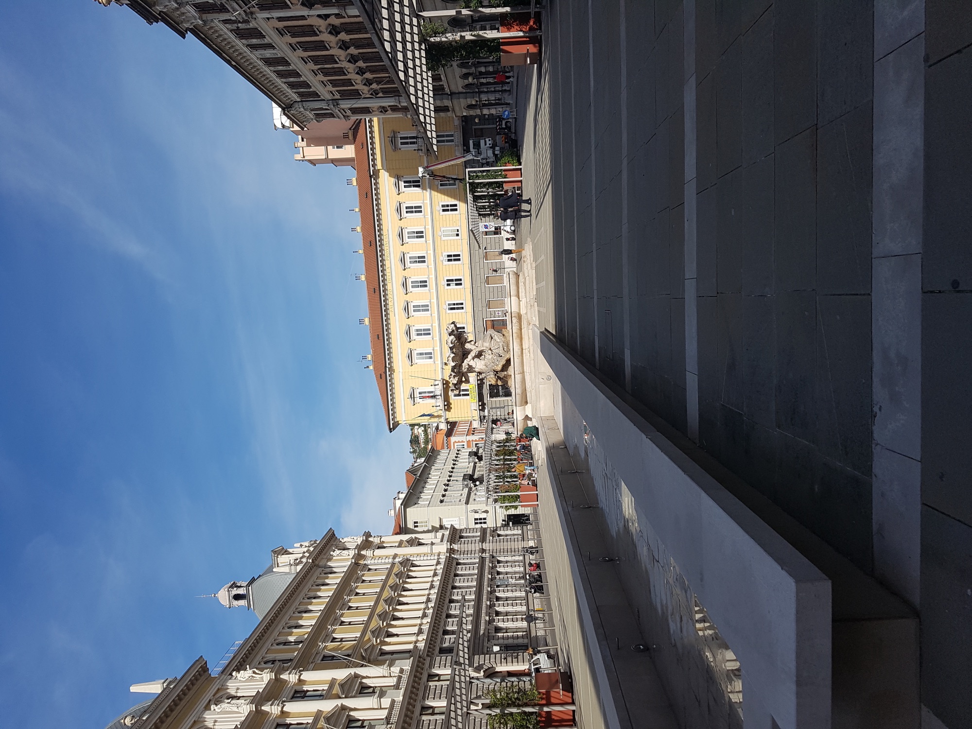Stone church and tall bell tower in Trieste