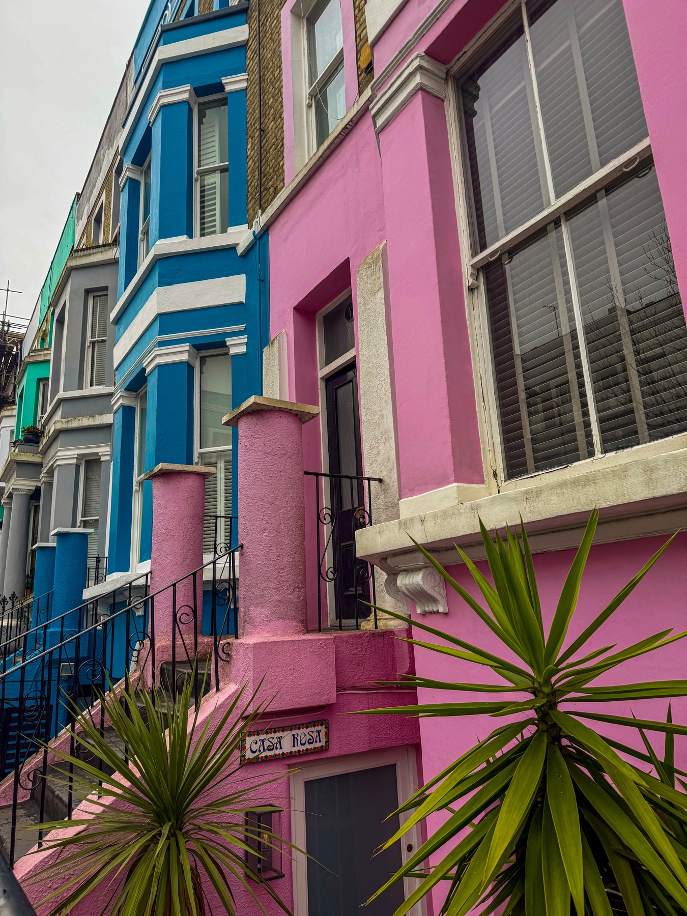 Pink and blue terraced houses in Notting Hill